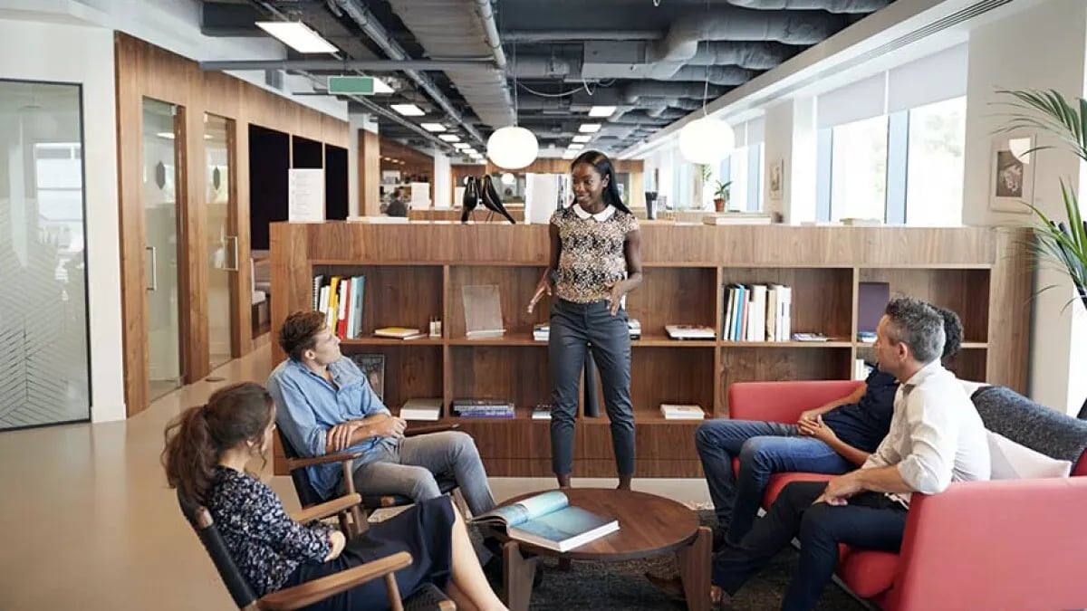 People in an office talking