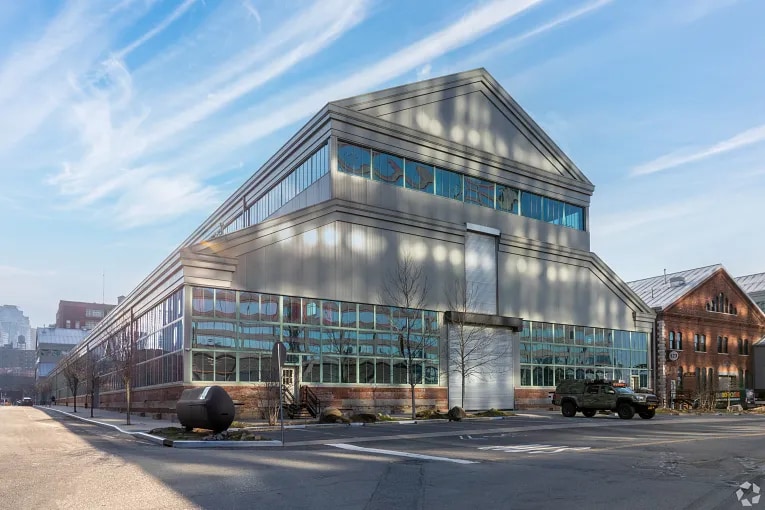 Exterior view of a recently renovated warehouse building in the Brooklyn Navy Yard neighborhood in Brooklyn, NY.