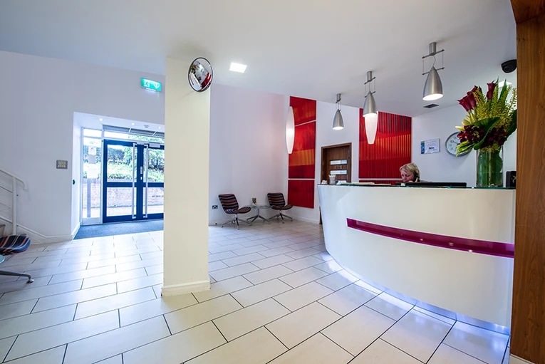 Reception area in a UK coworking facility, ideal for virtual office services including mail handling and professional call support.