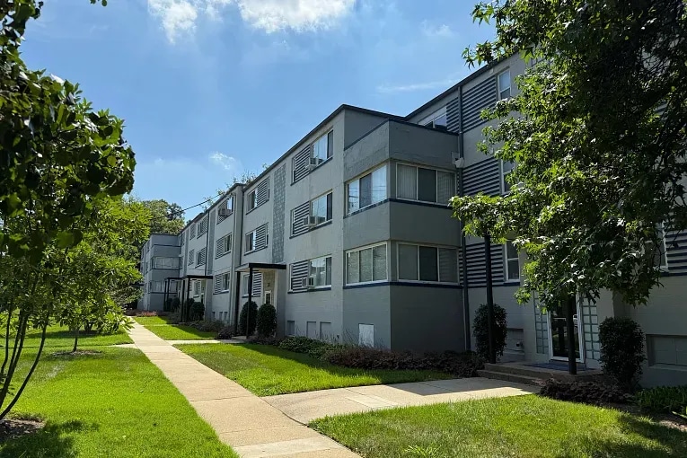Bauhaus-style multifamily apartment building in Greenbelt, Maryland, with clean lines and minimalist architectural features.